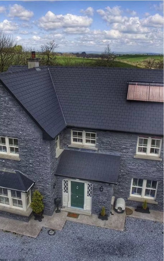Stone-clad family home built by Holcon Construction in Cork